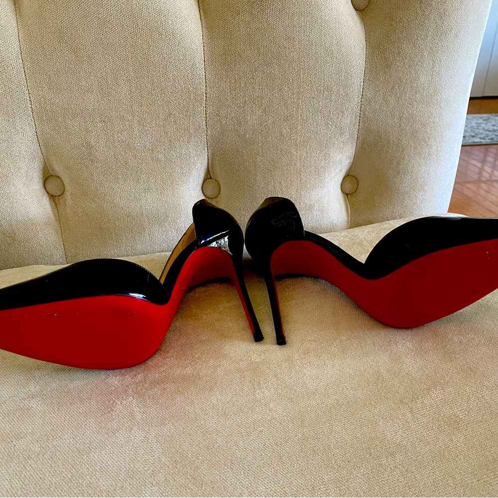 Christian Louboutin's half d'Orsay Iriza Pumps